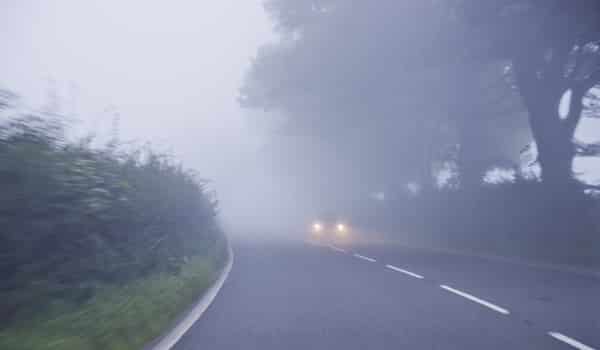 car driving in fog