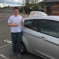 Congratulations to a very happy William Harris holding his practical driving test pass certificate ned to the JSF Driving School car